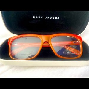 Marc Jacobs frames pinkish orange in color with black backing